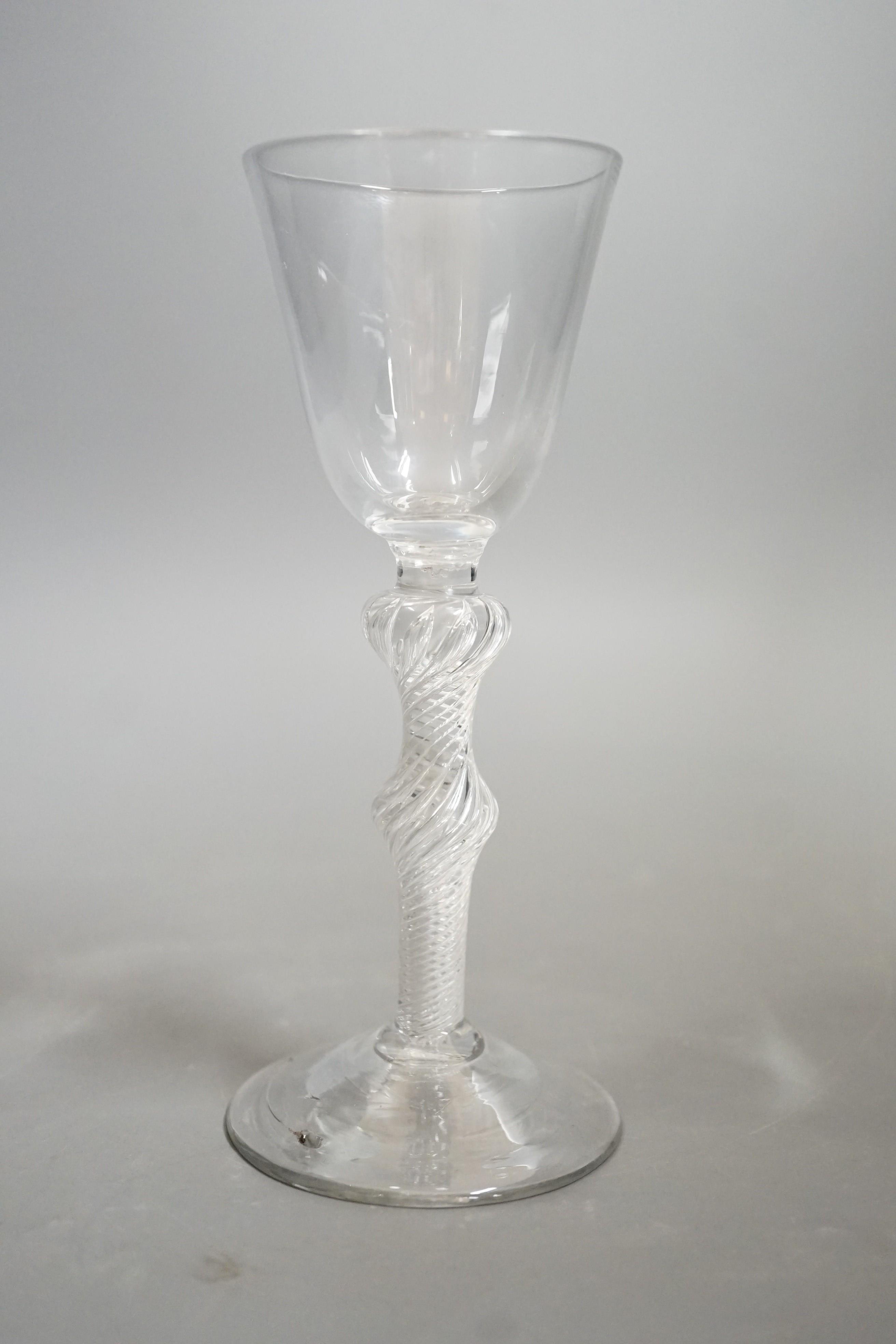 A mid 18th century double knop airtwist wine glass, 16cms high